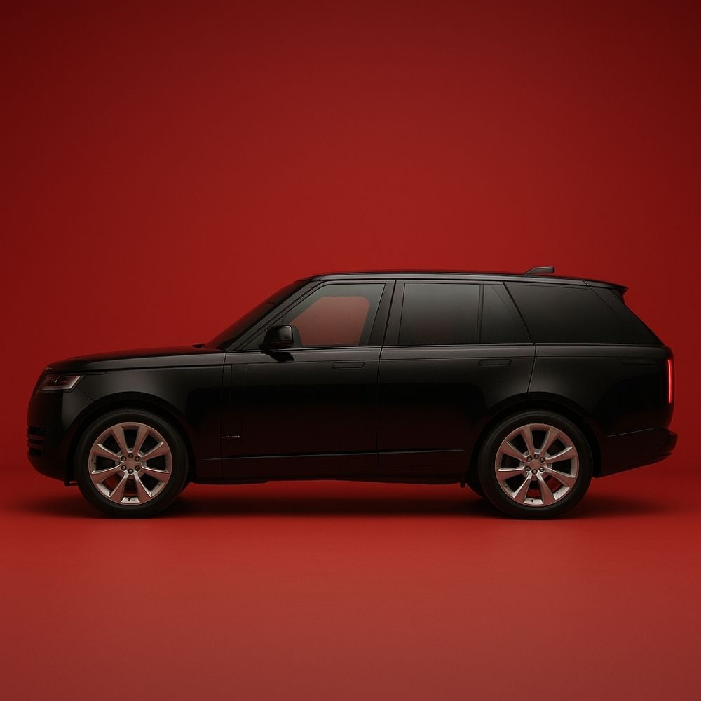 Land Rover yedek parça Şaşmaz – kırmızı fon üzerinde siyah Range Rover Vogue yandan görünüm.